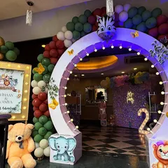 The entrance to the wild adventure. We created a custom lighted archway with animal cutouts and a themed welcome sign to build excitement from the moment guests arrive.