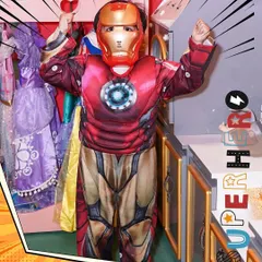 An aspiring Iron Man strikes a powerful pose. Our dress-up corner is filled with costumes that let kids step into the world of their heroes, boosting their confidence and creativity.