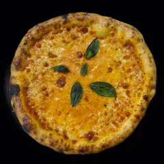 A look at our classic Margherita pizza, fresh from the oven. We use premium cheese and fresh basil for an authentic Italian taste that is always a crowd pleaser at parties and corporate events.