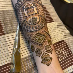 The arm band design in progress, with more details being added. You can see the 3D effect created by shading the 'kalash' and lotus motifs.