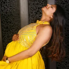 We also offer non-maternity gowns for pre-wedding shoots and other events. This hand-embroidered yellow satin gown is a vibrant and flowy option for any celebration.