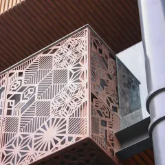 From the smooth MS columns to the geometric play of the MS Jali, this facade is a masterclass in texture. The light and shadow create a constantly shifting artwork on the building's surface.