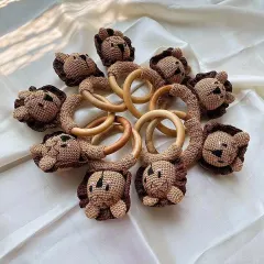 Here is a collection of my lion rattles, made with baby-safe yarn and natural wood rings. These are a great example of a bulk order I did for eco-friendly and vegan baby toys.