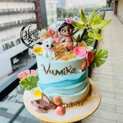 I brought the magic of Motunui to life with this Moana-themed birthday cake. It features hand-sculpted fondant figures of Moana and Pua on a sandy beach, complete with buttercream waves and tropical flowers, perfect for a Disney-themed party.
