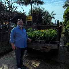 Here I am at my nursery, ready to help you find the perfect plants and pots. Whether you need a single plant for your home or a bulk order for corporate gifting, I am here to ensure you get the best quality and service.