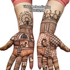 I love creating these fully detailed traditional mehandi designs. This piece features classic peacock and architectural motifs, perfect for a wedding guest who wants an elaborate look.