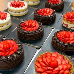 A beautiful lineup of our strawberry cakes ready to go out to customers. You can see the variety, including the Chocolate Strawberry, Strawberry Gateau, and Strawberry Biscoff Cheesecake.