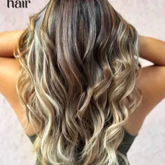 My version of a subtle calico hair color. This is a beautiful mix of different blonde and brown tones, creating a unique, multi-dimensional look that required bleach for the lighter pieces.