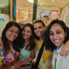 A candid photo of some of our team members. We are more than colleagues; we are a tribe of mothers and educators who are passionate about working with children and support each other on this journey.