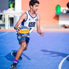 A youth player driving to the basket, demonstrating skill and determination. My leagues are a platform for the next generation of basketball stars.