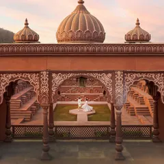 Using a drone, I can capture your love story from a grand perspective. This shot at Sets in the City shows how we can create a truly epic and royal pre-wedding portrait that feels like a scene from a movie.