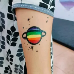 A colorful planet tattoo, perfect for a space-themed party or for any child who loves astronomy. Our artists are skilled in detailed work.