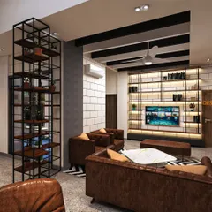 An industrial-chic lounge area designed for a modern office. We used a mix of exposed brick-style walls, metal shelving, and comfortable leather furniture to create a relaxed yet professional atmosphere, perfect for team brainstorming or client meetings.