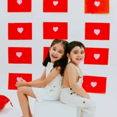 Back to back and full of laughs. Sibling sessions are a beautiful way to capture the unique bond and playful dynamic between your children as they grow.