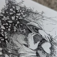 An angled detail shot of the ink drawing, highlighting the depth created by the dense cross hatching technique in the shadows.