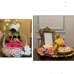 We offer a wide variety of styles for our return favours. On the left, a silver basket with a vibrant pink potli bag offers a traditional feel, while on the right, an ornate gold photo frame is paired with a tray of dry fruits for a classic, elegant look.