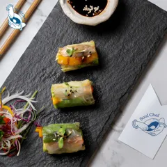 Fresh and light Vietnamese Rice Paper Rolls, filled with crisp vegetables and herbs. A healthy and elegant option for any gathering.