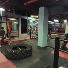 We build real, functional strength. This isn't just about lifting weights; it's about preparing your body for any challenge with tools like tires and sledgehammers.