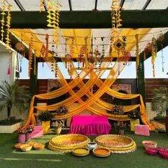 I love bringing vibrant energy to Haldi ceremonies. This outdoor setup uses traditional marigolds and yellow drapes, creating a picture-perfect backdrop for a day full of fun, laughter, and unforgettable moments.