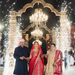 A bridal entry should be pure magic. I designed this moment for the bride to walk with her parents through a path of cold pyros and low-lying fog, leading to an emotional and grand reveal under magnificent chandeliers.