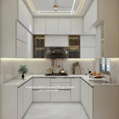 A spacious U-shaped kitchen in all-white, which makes the space feel bright and expansive. The design includes ample counter space and smart storage, with under-cabinet lighting for task-focused work.