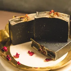 My 'Barood' charcoal body bar is a customer favorite for deep cleansing. Activated charcoal draws out impurities, while goat's milk ensures your skin feels soft and moisturized, not tight.