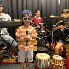 The DEY’Z MUSIC school band. This is what it's all about: students of different ages and instruments coming together to create music.