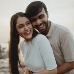 Pure, uninhibited laughter captured during a Mumbai pre-wedding shoot. This candid moment is what it's all about: capturing the real joy and friendship in your love story.