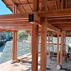 A work-in-progress shot of a market plaza in Champawat, Uttarakhand. This image captures the beauty of the wooden frame structure during the construction phase.