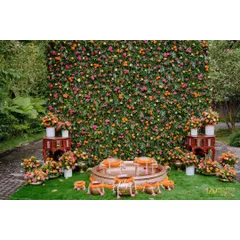 I believe a Haldi ceremony should radiate pure joy. Here, a lush wall of vibrant marigolds and roses creates a stunning backdrop, while traditional brass urlis and low seating invite guests into a space that feels both festive and intimate.