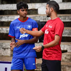 A one-on-one discussion between a coach and a young team captain. We focus on developing leadership skills and game intelligence, ensuring our players are prepared for every situation.