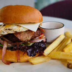 Another look at my rule-breaking burger, fully loaded and served with a side of crispy fries.