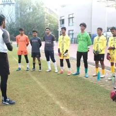 Mr. Manish Kajania instructs our youth and elite goalkeepers during an on-field training session.