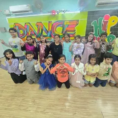A happy group shot of our kids' batch after a great class. We foster a sense of community and friendship, making the studio a second home for our young dancers.