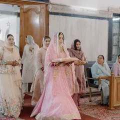 The bride's entrance at her Anand Karaj, a moment of grace and tradition.