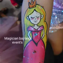 For kids who prefer arm painting, I can create detailed characters like this lovely princess with a sparkling dress. It's like a temporary tattoo but much more colorful.