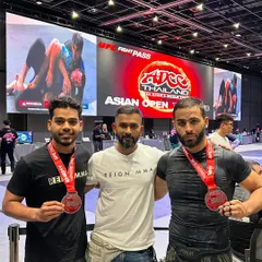 The proof is in the performance. Here I am with two of my fighters, Ayaan and Zaid, after they both secured silver medals at the prestigious ADCC Asian Open in Thailand. We train to compete and win at the highest levels.