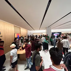 The crowd on inauguration day at the Apple store in Delhi. Seeing the space come alive with customers is the final step in a long journey of planning and execution.