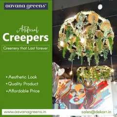 Level up your style with my artificial creepers. This restaurant features a stunning chandelier made of hanging green and yellow foliage, showing how greenery can be used to create unique, aesthetic, and affordable decor.