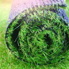 This is a close look at the high-quality artificial turf I use before it's installed. The dense fibers and durable backing are designed to be UV-resistant and weatherproof, ensuring a long-lasting, vibrant green lawn for your space.