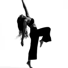 A black and white movement portrait, capturing a moment of full extension and release. These photos explore the architecture of the dancing body.