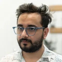 This is the 'before' shot. A good haircut is about understanding the hair's natural texture and the client's style to create a look that is both flattering and easy to manage.