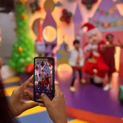 A parent captures the magical moment of her kids meeting Santa Claus at our Christmas event. These are the memories that last a lifetime.