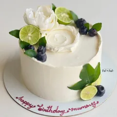My most popular creation, the signature Italian Lemon & Blueberry cake. I offer many design variations, all featuring fresh blueberries, zesty lime, and smooth buttercream.
