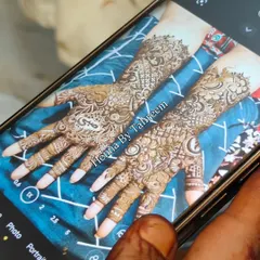 Capturing the final result. I always take photos of my work to make sure every detail is perfect, just like in this intricate bridal design. Mashallah.