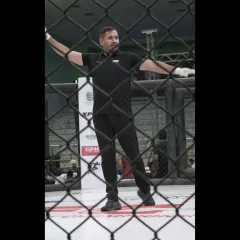Our coach in his element, officiating a professional MMA bout. This level of experience is what we bring to every training session.