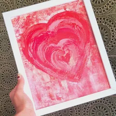A study in red, this painting explores love through concentric hearts. Each layer of red is slightly different, creating a tunnel-like effect that draws you in. It’s a simple but powerful piece about the depth of love.
