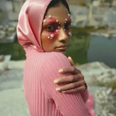 This shot is from a conceptual editorial where we explored the contrast between soft textures and raw nature. The styling focused on monochromatic layering and avant-garde makeup to create a striking, otherworldly visual.