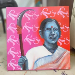 Another perspective of the "Sickle" painting in my studio. The vibrant pink and red background contrasts with the cool blue of her skin, creating a visually jarring effect that is meant to be provocative.
