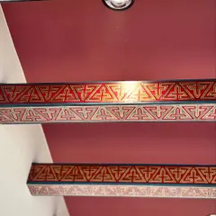 Inspired by Arabic art, these hand-painted wooden rafters transform structural elements into cultural canvases. The intricate geometric patterns and earthy tones add warmth, poetry, and tradition to the ceiling.